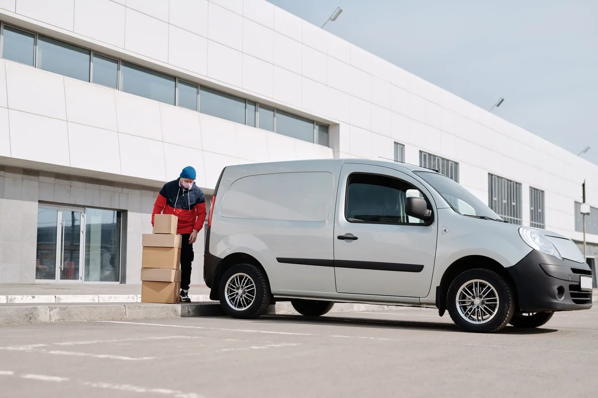 Service van delivering at a commercial facility